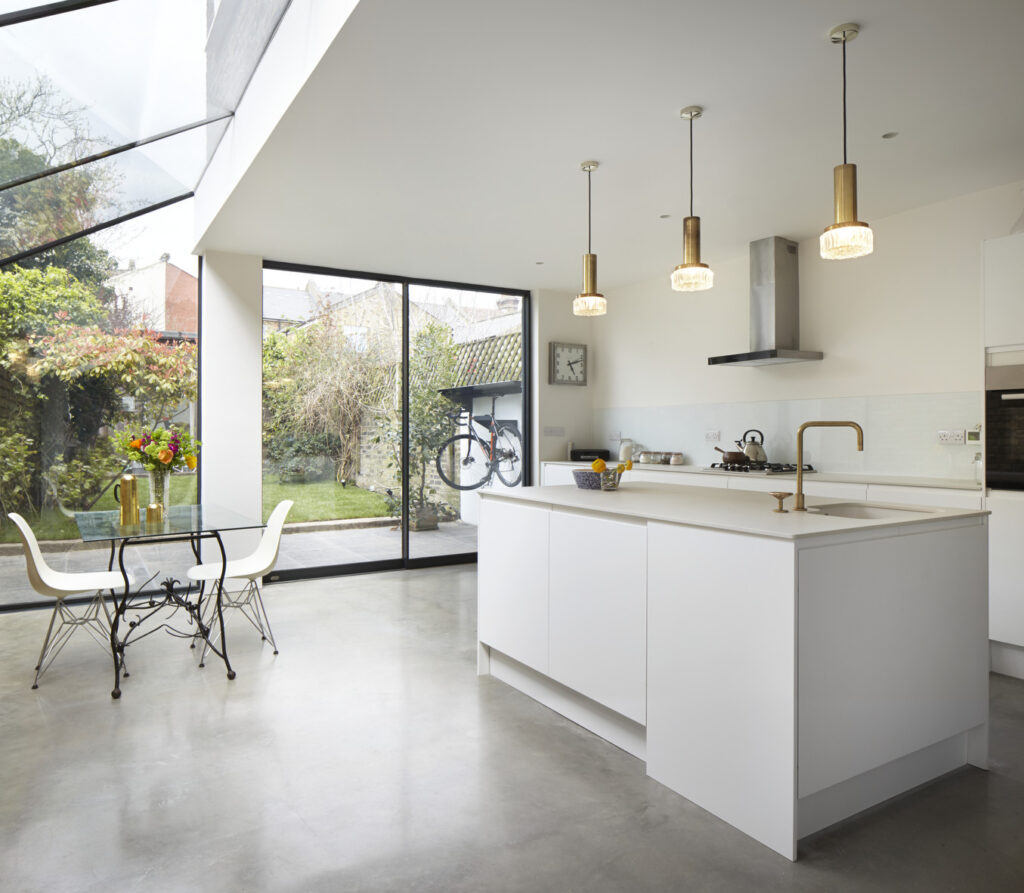 Polished concrete floor seen in a modern kitchen conversion