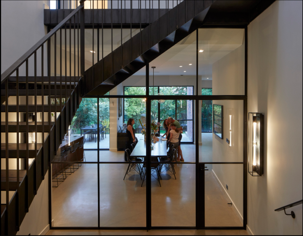 Hall and kitchen in modern home, with polished concrete floor