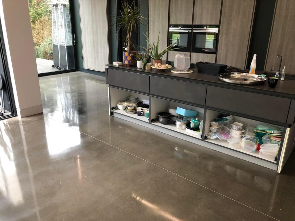 Modern kitchen with polished concrete floor